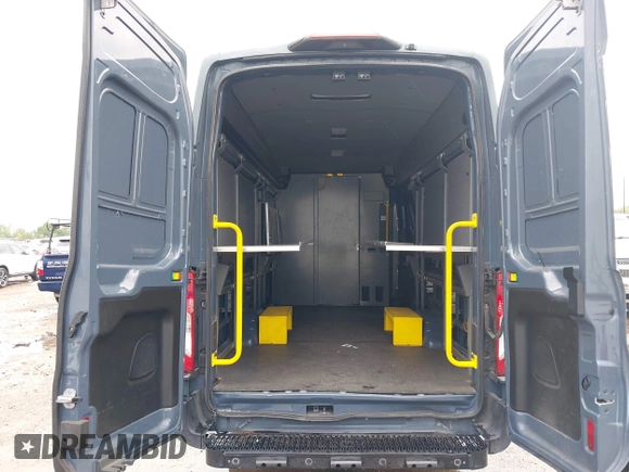 2019 Ford Transit with VIN 1FTYR3XMXKKB90237, listed as a IAAI auction lot 41859617 with 86,081 mi miles and . Bid and sale history available at DreamBid. Image 19.