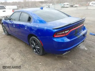 2022 Dodge Charger SXT with VIN 2C3CDXJG6NH143483, listed as a IAAI auction lot 41642211 with 111,484 mi miles. Bid and sale history available at carsss.com. Image 3.