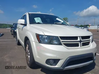 2015 Dodge Journey R/T with VIN 3C4PDDEG9FT740304, listed as a IAAI auction lot 42731346 with 106,932 mi miles and . Bid and sale history available at DreamBid. Image 1.