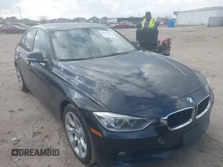 2014 BMW 3 Series 335i with VIN WBA3A9C54EF478025, listed as a IAAI auction lot 41513191 with 119,632 mi miles. Bid and sale history available at carsss.com. Image 1.
