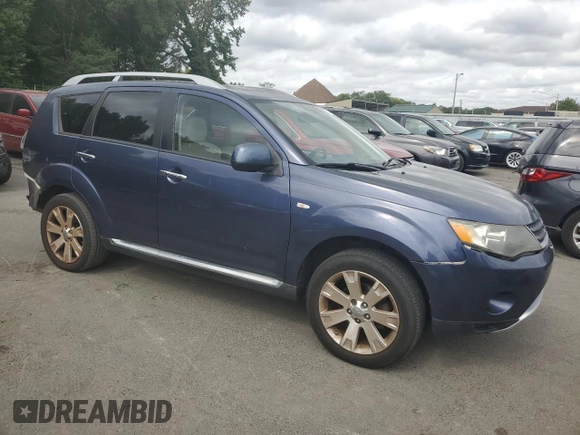 2009 Mitsubishi Outlander SE with VIN JA4MT31W89Z001770, listed as a Copart auction lot 70411544 with 161,549 mi miles and Salvage title. Bid and sale history available at DreamBid. Image 4.