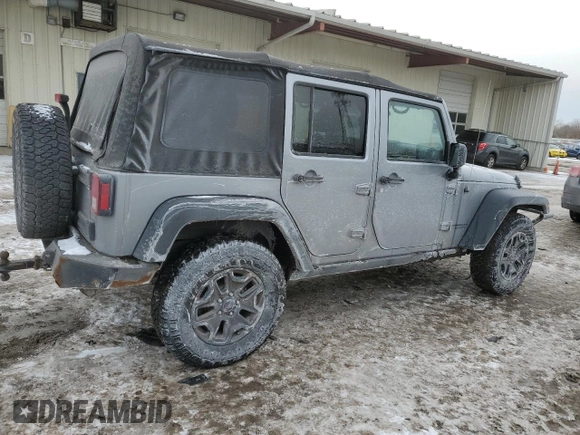 2015 Jeep Wrangler Unlimited Willys Wheeler with VIN 1C4BJWDG9FL516493, listed as a Copart auction lot 45098345 with 152,009 mi miles and Salvage Title. Bid and sale history available at DreamBid. Image 3.