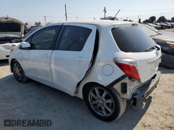 2012 Toyota Yaris L with VIN JTDKTUD30CD527531, listed as a Copart auction lot 65022015 with 157,177 mi miles and Salvage title. Bid and sale history available at DreamBid. Image 2.