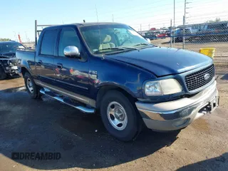 2002 Ford F-150 XLT with VIN 1FTRW07692KC25069, listed as a IAAI auction lot 41387047 with 208,811 mi miles. Bid and sale history available at carsss.com. Image 1.