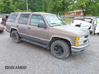 1997 Chevrolet Tahoe z VIN 1GNEK13R0VJ399744, wystawiony jako IAAI lot #42341218 z przebiegiem 189 252 mil mil oraz . Historia ofert i sprzedaży dostępna na DreamBid. Obrazek 1.