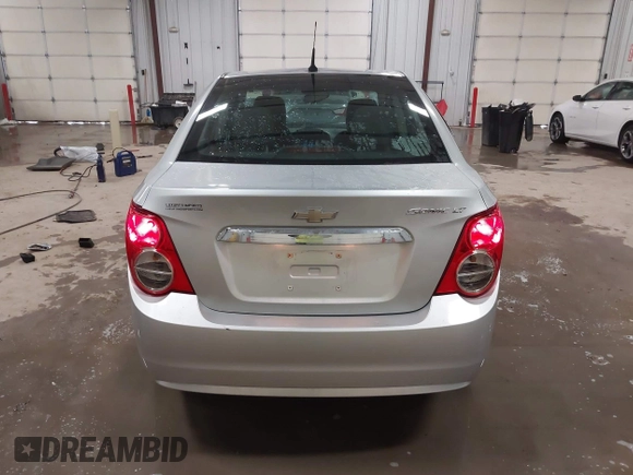 2014 Chevrolet Sonic LT with VIN 1G1JC5SG8E4107664, listed as a IAAI auction lot 41614306 with 128,946 mi miles and . Bid and sale history available at DreamBid. Image 16.