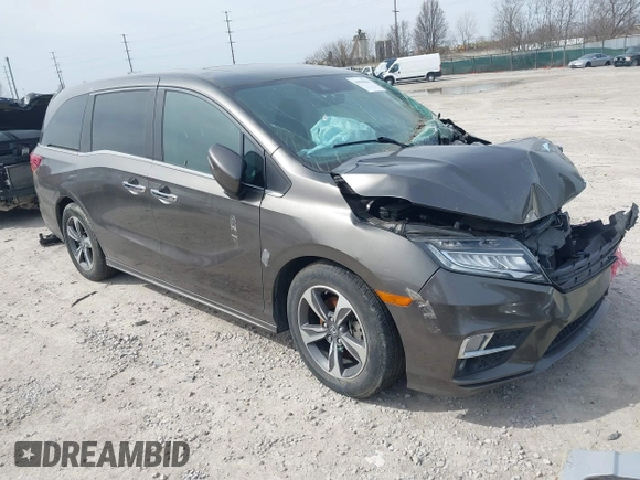 2018 Honda Odyssey Touring with VIN 5FNRL6H83JB008463, listed as a IAAI auction lot 41805044 with 65,001 mi miles. Bid and sale history available at carsss.com. Image 1.