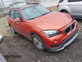 2015 BMW X1 xDrive28i with VIN WBAVL1C50FVY41206, listed as a IAAI auction lot 41508136 with 102,725 mi miles. Bid and sale history available at carsss.com. Image 1.
