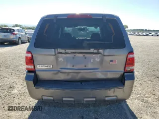 2009 Ford Escape XLS z VIN 1FMCU02729KA14846, wystawiony jako Copart lot #61658205 z przebiegiem 239 852 mil mil oraz Czysty tytuł • Clean title. Historia ofert i sprzedaży dostępna na DreamBid. Obrazek 6.