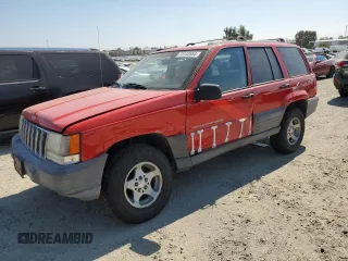 1997 Jeep Grand Cherokee TSi with VIN 1J4FX58SXVC545910, listed as a Copart auction lot 73142554 with 180,896 mi miles and Salvage Title. Bid and sale history available at carsss.com. Image 1.