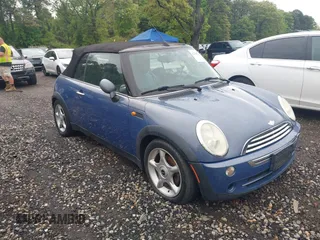 2006 MINI Convertible with VIN WMWRF33556TG15570, listed as a IAAI auction lot 42255162 with 116,228 mi miles and . Bid and sale history available at DreamBid. Image 1.