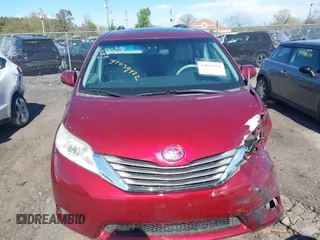2014 Toyota Sienna XLE with VIN 5TDYK3DC8ES457940, listed as a IAAI auction lot 42039472 with 99,769 mi miles and . Bid and sale history available at DreamBid. Image 12.