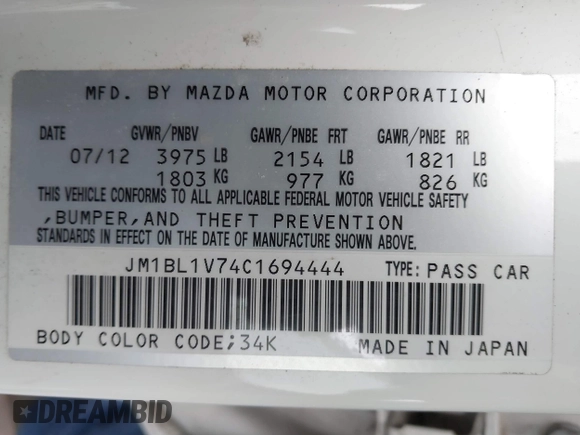 2012 Mazda Mazda3 i Touring with VIN JM1BL1V74C1694444, listed as a IAAI auction lot 41879335 with 123,020 mi miles. Bid and sale history available at carsss.com. Image 9.