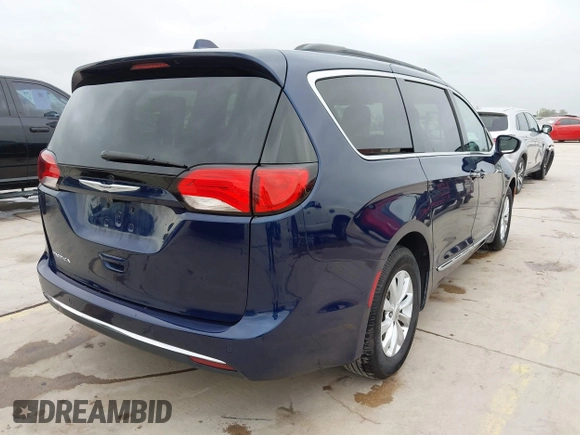 2017 Chrysler Pacifica Touring L with VIN 2C4RC1BG2HR526422, listed as a IAAI auction lot 42032839 with 180,710 mi miles and . Bid and sale history available at DreamBid. Image 4.