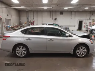 2014 Nissan Sentra S with VIN 3N1AB7APXEY306240, listed as a IAAI auction lot 41276111 with 113,356 mi miles and . Bid and sale history available at DreamBid. Image 13.