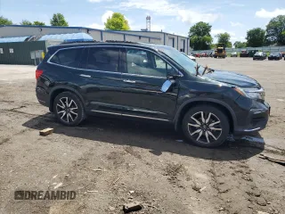 2020 Honda Pilot Touring 8-Passenger with VIN 5FNYF6H99LB053227, listed as a Copart auction lot 61302225 with 118,156 mi miles and Salvage title. Bid and sale history available at DreamBid. Image 4.