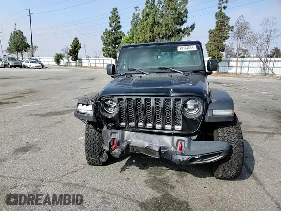 2020 Jeep Gladiator Rubicon z VIN 1C6JJTBG7LL197837, wystawiony jako Copart lot #58169095 z przebiegiem 59 578 mil mil oraz Szkoda całkowita • Salvage title. Historia ofert i sprzedaży dostępna na DreamBid. Obrazek 13.