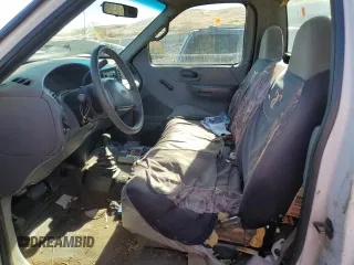 1999 Ford F-150 z VIN 1FTRF18W1XKA87801, wystawiony jako Copart lot #79094454 z przebiegiem Nie podano mil oraz Szkoda całkowita • Salvage title. Historia ofert i sprzedaży dostępna na DreamBid. Obrazek 7.