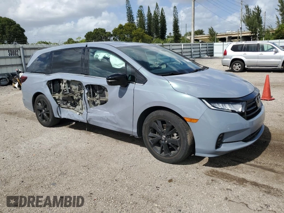 2023 Honda Odyssey Sport with VIN 5FNRL6H71PB068791, listed as a Copart auction lot 77479764 with 15,667 mi miles and Salvage Title. Bid and sale history available at carsss.com. Image 4.
