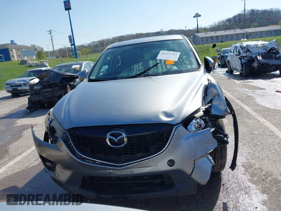 2013 Mazda CX-5 Touring with VIN JM3KE2CE6D0164430, listed as a IAAI auction lot 41961655 with 194,278 mi miles. Bid and sale history available at carsss.com. Image 13.