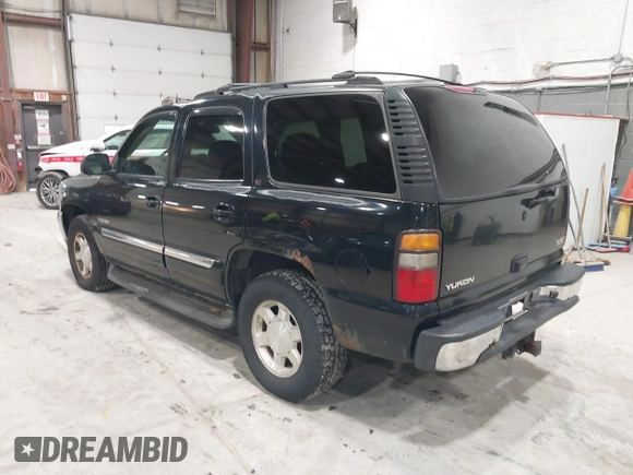 2005 GMC Yukon SLT with VIN 1GKEK13T15J143363, listed as a IAAI auction lot 41996424 with 272,819 mi miles. Bid and sale history available at carsss.com. Image 3.