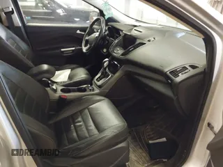 2013 Ford Escape SE with VIN 1FMCU9G99DUA02866, listed as a IAAI auction lot 42087543 with 260,585 mi miles. Bid and sale history available at carsss.com. Image 5.