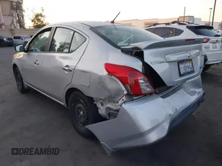 2015 Nissan Versa SV with VIN 3N1CN7AP0FL800136, listed as a IAAI auction lot 41889290 with 158,022 mi miles. Bid and sale history available at carsss.com. Image 3.