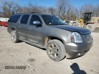 2012 GMC Yukon XL SLT with VIN 1GKS2KE72CR279315, listed as a Copart auction lot 87589195 with 220,584 mi miles and Salvage Title. Bid and sale history available at carsss.com. Image 4.