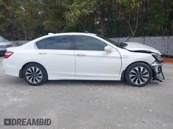 2017 Honda Accord Touring with VIN JHMCR6F73HC004661, listed as a IAAI auction lot 40806581 with 111,692 mi miles and . Bid and sale history available at DreamBid. Image 13.