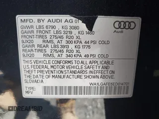 2014 Audi Q7 Premium Plus with VIN WA1LGAFE5ED014701, listed as a IAAI auction lot 42107552 with 98,919 mi miles and . Bid and sale history available at DreamBid. Image 9.