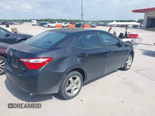 2015 Toyota Corolla L with VIN 5YFBURHE7FP255910, listed as a IAAI auction lot 42132289 with 97,635 mi miles and . Bid and sale history available at DreamBid. Image 4.
