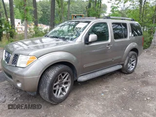 2005 Nissan Pathfinder SE z VIN 5N1AR18WX5C748572, wystawiony jako IAAI lot #42180475 z przebiegiem 291 301 mil mil oraz . Historia ofert i sprzedaży dostępna na DreamBid. Obrazek 19.