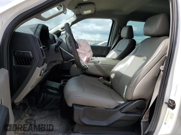 2019 Ford F-150 XL with VIN 1FTEW1CBXKKF14856, listed as a Copart auction lot 71306444 with 100,057 mi miles and Salvage title. Bid and sale history available at DreamBid. Image 7.