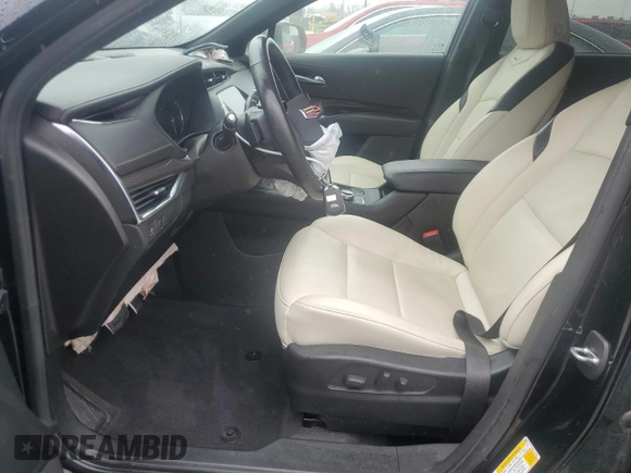 2022 Cadillac XT4 AWD Sport с VIN 1GYFZFR46NF170841, выставлен на аукционе Copart как лот 55863705 с пробегом 14 745 миль миль и Списание • Salvage title. История ставок и продаж доступна на DreamBid. Изображение 7.