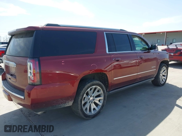 2020 GMC Yukon XL Denali with VIN 1GKS1HKJ3LR238701, listed as a IAAI auction lot 41724274 with 107,323 mi miles and . Bid and sale history available at DreamBid. Image 4.
