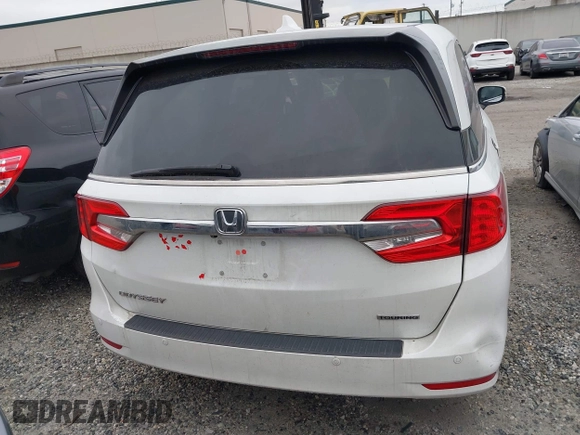 2020 Honda Odyssey Touring with VIN 5FNRL6H81LB028083, listed as a IAAI auction lot 42003810 with 71,536 mi miles and . Bid and sale history available at DreamBid. Image 16.
