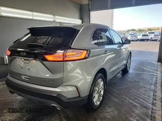 2020 Ford Edge Titanium with VIN 2FMPK4K92LBA30658, listed as a IAAI auction lot 42848998 with 63,460 mi miles and . Bid and sale history available at DreamBid. Image 28.