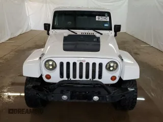 2012 Jeep Wrangler Arctic with VIN 1C4AJWBG4CL146788, listed as a Copart auction lot 75648234 with 100,879 mi miles and Clean title. Bid and sale history available at DreamBid. Image 5.