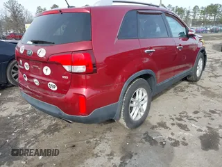 2014 Kia Sorento LX with VIN 5XYKT4A7XEG482738, listed as a IAAI auction lot 41295018 with 64,080 mi miles and . Bid and sale history available at carsss.com. Image 4.