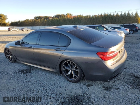 2017 BMW 7 Series with VIN WBA7F2C32HG422866, listed as a Copart auction lot 76177184 with 146,565 mi miles and Salvage Title. Bid and sale history available at DreamBid. Image 2.