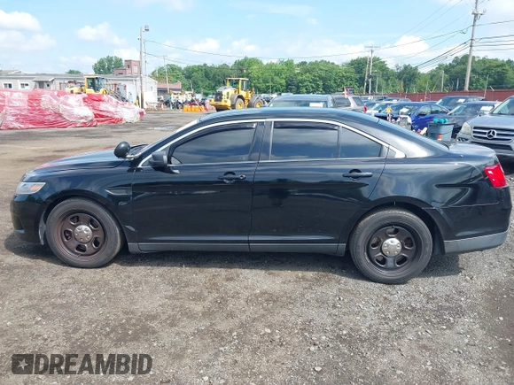 2014 Ford Police Interceptor with VIN 1FAHP2MK0EG170496, listed as a IAAI auction lot 42693683 with 147,921 mi miles and . Bid and sale history available at DreamBid. Image 14.