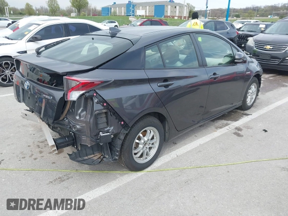 2018 Toyota Prius Two with VIN JTDKARFU7J3553216, listed as a IAAI auction lot 41979005 with 61,818 mi miles. Bid and sale history available at carsss.com. Image 4.