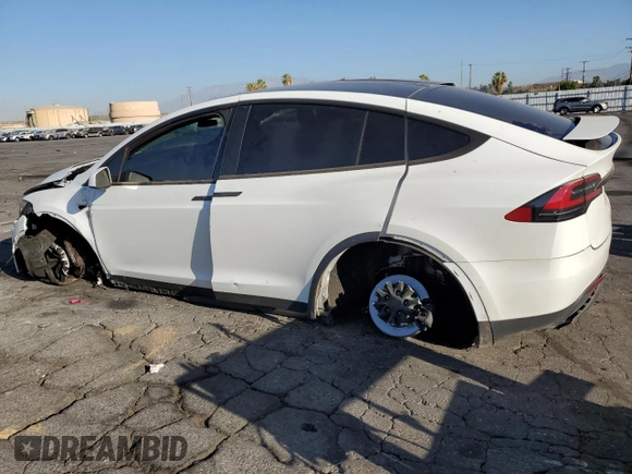 2021 Tesla Model X Long Range Plus with VIN 5YJXCBE22MF311576, listed as a Copart auction lot 68583984 with 83,137 mi miles and Salvage Title. Bid and sale history available at carsss.com. Image 2.