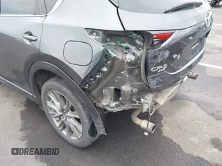 2020 Mazda CX-5 Grand Touring with VIN JM3KFBDM4L0829861, listed as a IAAI auction lot 41826250 with 62,091 mi miles and . Bid and sale history available at carsss.com. Image 6.
