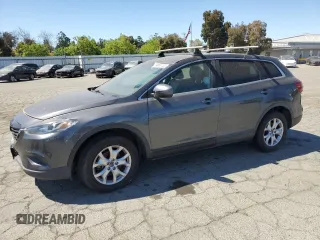 2015 Mazda CX-9 Touring z VIN JM3TB3CA6F0453830, wystawiony jako Copart lot #56558445 z przebiegiem 84 199 mil mil oraz Czysty tytuł • Clean title. Historia ofert i sprzedaży dostępna na DreamBid. Obrazek 1.