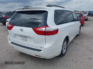 2016 Toyota Sienna LE AAS with VIN 5TDKK3DCXGS709132, listed as a IAAI auction lot 41993473 with 270,811 mi miles. Bid and sale history available at carsss.com. Image 4.