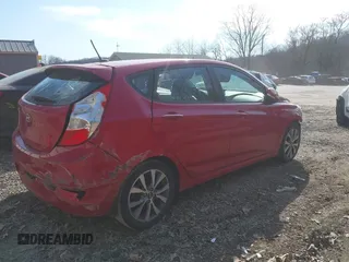 2015 Hyundai Accent Sport with VIN KMHCU5AE5FU200846, listed as a IAAI auction lot 41758805 with 84,987 mi miles. Bid and sale history available at carsss.com. Image 4.
