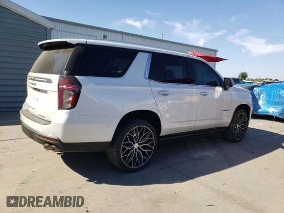 2023 Chevrolet Tahoe Premier with VIN 1GNSCSKD6PR119132, listed as a Copart auction lot 74594664 with 27,716 mi miles and Salvage title. Bid and sale history available at DreamBid. Image 3.