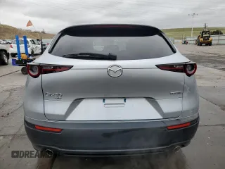 2021 Mazda CX-30 Preferred с VIN 3MVDMBCL5MM248575, выставлен на аукционе Copart как лот 52821575 с пробегом 47 364 миль миль и Списание • Salvage title. История ставок и продаж доступна на DreamBid. Изображение 6.