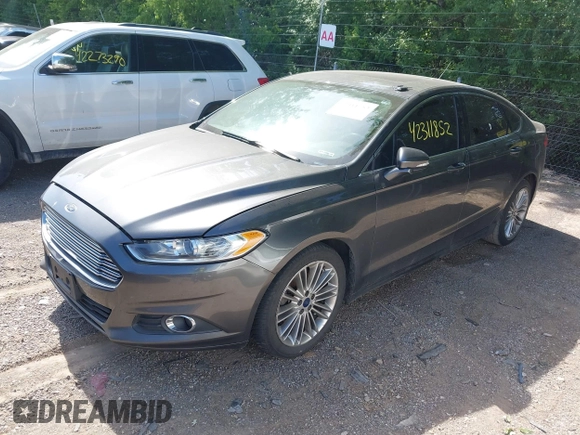 2015 Ford Fusion SE z VIN 3FA6P0H98FR275848, wystawiony jako IAAI lot #42311852 z przebiegiem 197 536 mil mil oraz . Historia ofert i sprzedaży dostępna na DreamBid. Obrazek 2.